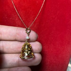 Bell with fresh water pearl necklace